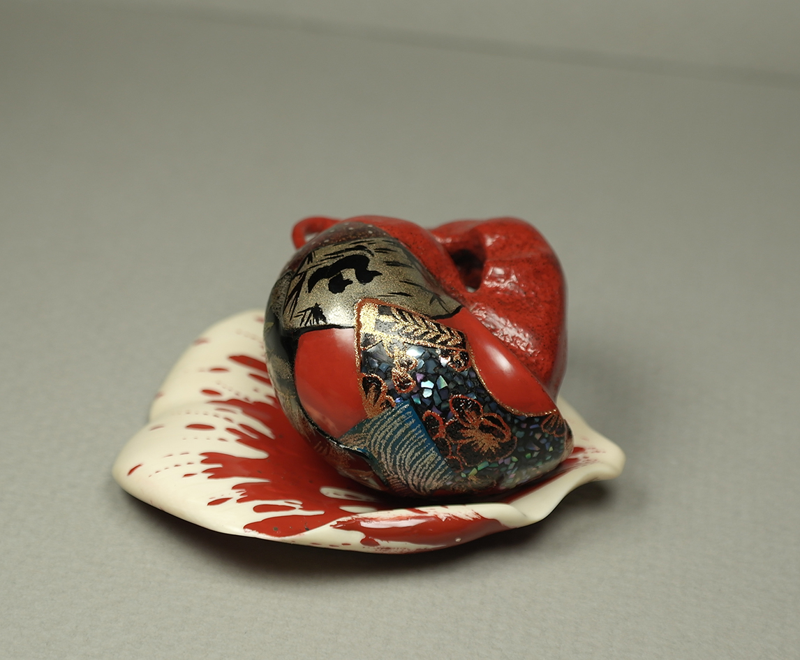 Red snail with fans 004